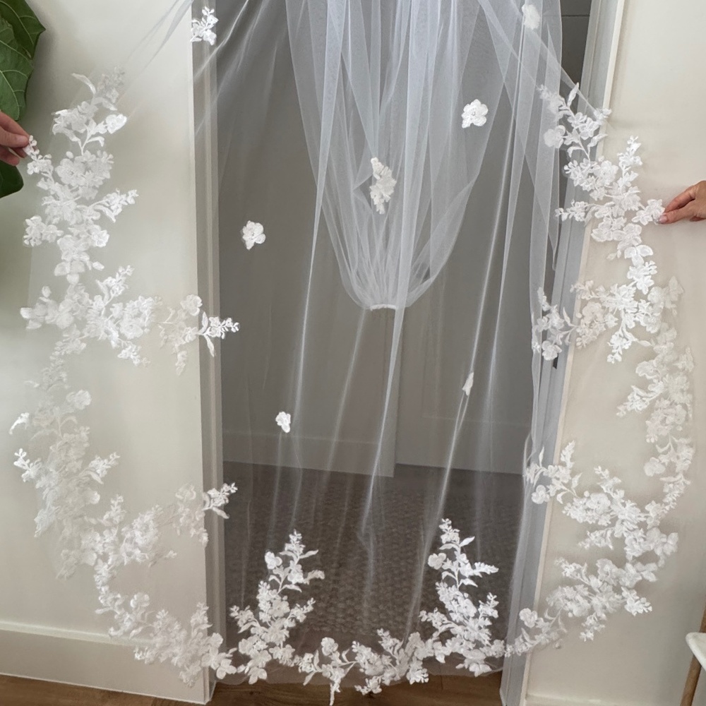 White cathedral-length wedding veil
